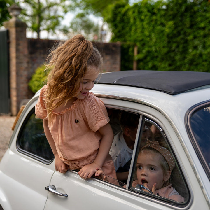 Kurzer Jumpsuit Pfirsich - Mädchen 1