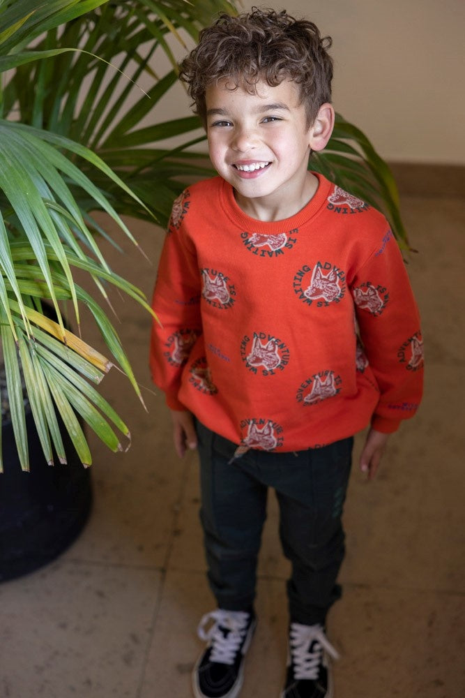 Sweater Oranje - Chasing Trails